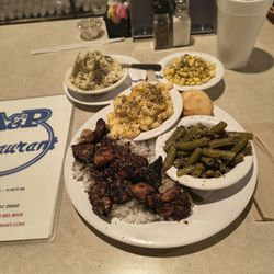 A & P Restaurant - Stir fried chicken on rice with green beans mac and cheese and coleslaw and corn