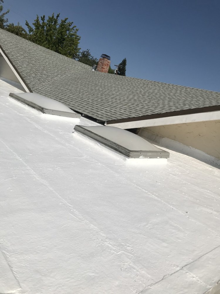 Slide of J V Roofing