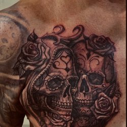 Tattoo Frenzy - Day of the Dead Skulls. Work done by Thom Boyle.