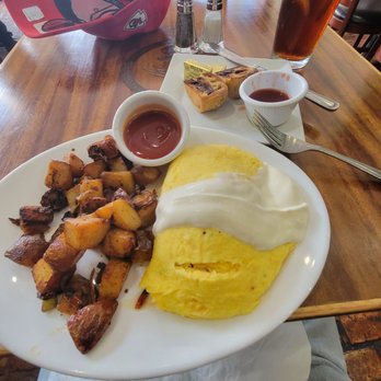The Chef's Corner - Mexican omelette, well-done home fries, homemade mini blueberry muffin. - New American Near Me - Mineola, New York