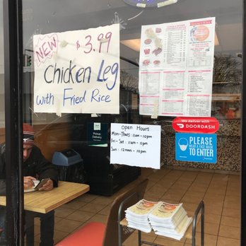 Golden City Asian Restaurant - a sign in the window - Chinese Near Me - Freeport, New York