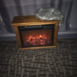 Joyful Feet - The heater in the room with our fireplace ambience