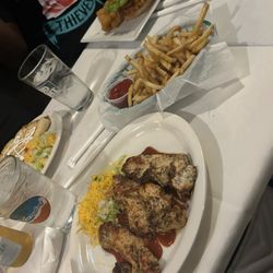 The Bottom Line - Jerk Chicken w/ fries