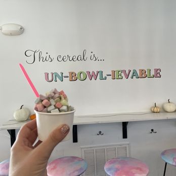 Wanna Spoon Cereal Bar - My order held up against the decorated wall - Coffee & Tea Near Me - Nashville, Tennessee Wanna Spoon Cereal Bar - My order held up against the decorated wall - Coffee & Tea Near Me - Nashville, Tennessee