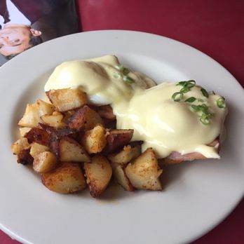 Chach Restaurant - Sharon's egg benedict. Ham is hiding under all that beautiful hollandaise and poached egg. - Diners Near Me - Provincetown, Massachusetts