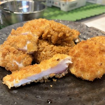 Sushi Murayama - Close up of the Shimaaji and fried XL Hokkaido scallops with Uni risotto - Sushi Bars Near Me - Honolulu, Hawaii Sushi Murayama - Close up of the Shimaaji and fried XL Hokkaido scallops with Uni risotto - Sushi Bars Near Me - Honolulu, Hawaii