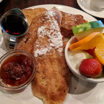 Normand's Restaurant - French toast, side fruit and pan potatoes. Comes with strawberry compote and real maple syrup - French Near Me - Edmonton, Alberta Normand's Restaurant - French toast, side fruit and pan potatoes. Comes with strawberry compote and real maple syrup - French Near Me - Edmonton, Alberta