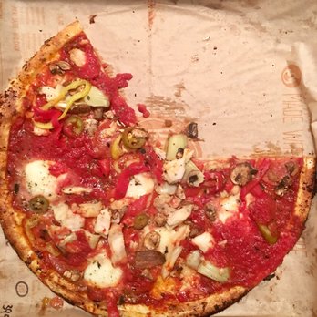 Blaze Pizza - Spicy red- pesto around it- round mozzarella, artichoke, jalapeño, banana pepper, mushroom, minced garlic. Topped with red sauce. Amazing! - Pizza Near Me - Visalia, California Blaze Pizza - Spicy red- pesto around it- round mozzarella, artichoke, jalapeño, banana pepper, mushroom, minced garlic. Topped with red sauce. Amazing! - Pizza Near Me - Visalia, California