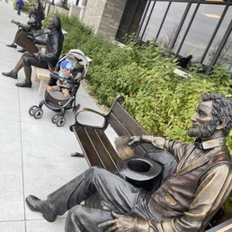 Take a seat with some of the 'greats' while you're waiting - in this political climate it might upset some though. straight face emoji