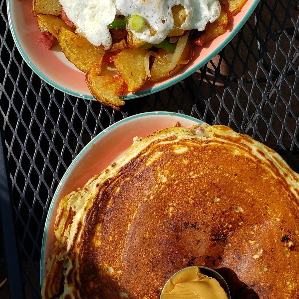 Nelson’s Market - Corn beef hash and a short stack of banana pecan pancakes with peanut butter - Breakfast & Brunch Near Me - Bellingham, Washington Nelson’s Market - Corn beef hash and a short stack of banana pecan pancakes with peanut butter - Breakfast & Brunch Near Me - Bellingham, Washington