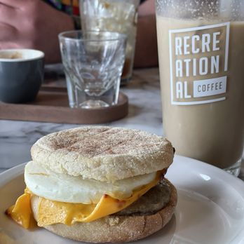Recreational Coffee - Sausage egg and cheese sandwich with a blueberry lavender latte - Coffee & Tea Near Me - Long Beach, California Recreational Coffee - Sausage egg and cheese sandwich with a blueberry lavender latte - Coffee & Tea Near Me - Long Beach, California