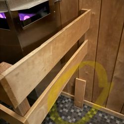 EōS Fitness - Broken/dislodged piece of wood in the women's sauna. If things the women's side, what does the men's look like???