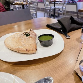 Sauce on the Side - Roasty toasty calzone with pesto sauce - Italian Near Me - Creve Coeur, Missouri