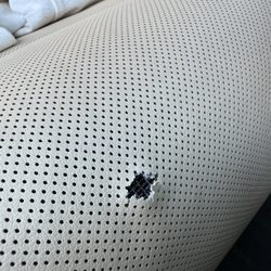 Tesla - Same damaged area from another angle. The service manager didn't even inspect it - just said "it's 3 years old".