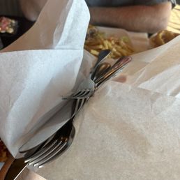 Asked three times, finally begged for silverware and this is what we were handed. Asked three times, finally begged for silverware and this is what we were handed.