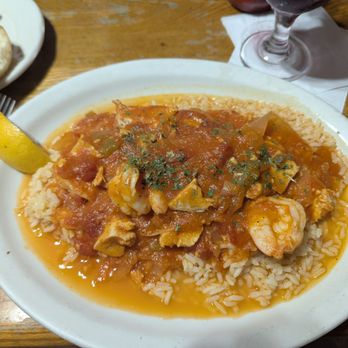 IV Seasons - Chicken and shrimp dish on rice - Portuguese Near Me - Lowell, Massachusetts IV Seasons - Chicken and shrimp dish on rice - Portuguese Near Me - Lowell, Massachusetts