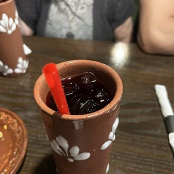 Tulum Mexican Kitchen - This was the Jamaica drink (hibiscus flower drink) I ordered. It came in a beautiful ceramic cup. It was delicious. - Mexican Near Me - Manteca, California