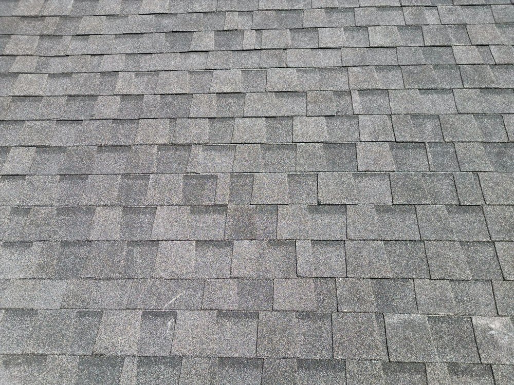 Slide of Whatley Roofing