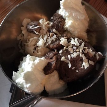Satis Bistro - German chocolate sundae. Excellent. Lots of crunches and coconut. Yum. - Wine Bars Near Me - Jersey City, New Jersey Satis Bistro - German chocolate sundae. Excellent. Lots of crunches and coconut. Yum. - Wine Bars Near Me - Jersey City, New Jersey