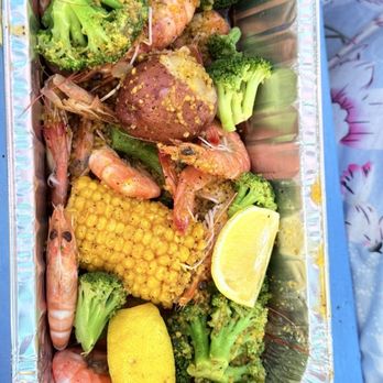 The Surfyard - Seafood broil comes with shrimp, potatoes, broccoli, corn on the cob and seasoning. - Seafood Near Me - Corpus Christi, Texas The Surfyard - Seafood broil comes with shrimp, potatoes, broccoli, corn on the cob and seasoning. - Seafood Near Me - Corpus Christi, Texas