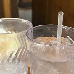 Johnny Carino's - Our water served on a plastic tumbler both were chipped and one had a crack going through it.