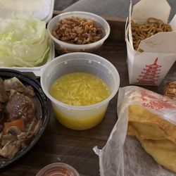 Golden China Express - Letttuce wraps, beef and mushrooms, egg drop soup, lo mein noodles, and crab rangoon.