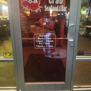 Rocking Crab - Front door with the hours open - Seafood Near Me - Jacksonville, Florida
