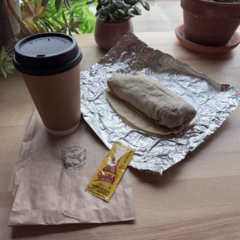 Reverie Coffee - Orange Cardamom Latte & Chorizo Breakfast Burrito (minus one bite that couldn't wait for the photo.) - Coffee & Tea Near Me - Brunswick, Maine Reverie Coffee - Orange Cardamom Latte & Chorizo Breakfast Burrito (minus one bite that couldn't wait for the photo.) - Coffee & Tea Near Me - Brunswick, Maine