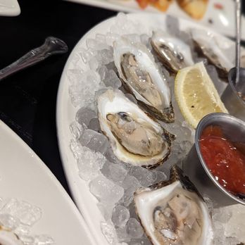 Edison's Gastropub - a plate of oysters on ice - Seafood Near Me - Bettendorf, Iowa Edison's Gastropub - a plate of oysters on ice - Seafood Near Me - Bettendorf, Iowa
