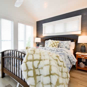 Homes by JICI - a bedroom with a large bed - General Contractors Near Me - Angola, Indiana Homes by JICI - a bedroom with a large bed - General Contractors Near Me - Angola, Indiana
