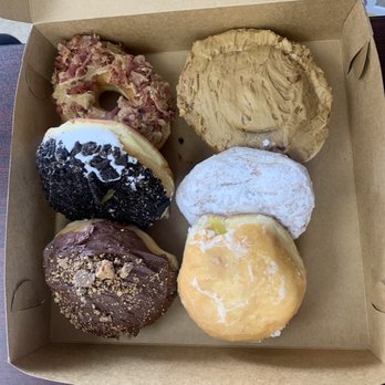 Yummies Donuts & BBQ - maple bacon, maple Cinnamon Bun Maple Iced, White Iced Oreos, Blueberry Powdered Sugar, reese's filled, Lemon Glazed - Bakeries Near Me - Venice, Florida Yummies Donuts & BBQ - maple bacon, maple Cinnamon Bun Maple Iced, White Iced Oreos, Blueberry Powdered Sugar, reese's filled, Lemon Glazed - Bakeries Near Me - Venice, Florida