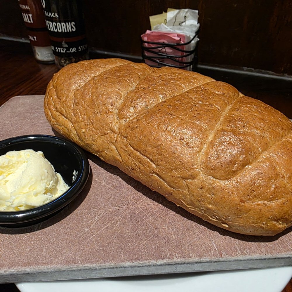 LongHorn Steakhouse - Rustic bread and butter for the table - Steakhouses Near Me - Franklin, Massachusetts LongHorn Steakhouse - Rustic bread and butter for the table - Steakhouses Near Me - Franklin, Massachusetts