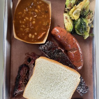 Killen's Barbecue - 3 meat deal. Sausage, pork ribs, brisket. Beans. Brussel sprouts. - Barbeque Near Me - Pearland, Texas