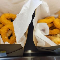 H Mart - $7.99 calamari, in deli area. Didn't try. :p