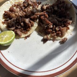 Fatty tacos , and old meat . Doest't even look like it's carne Asada.