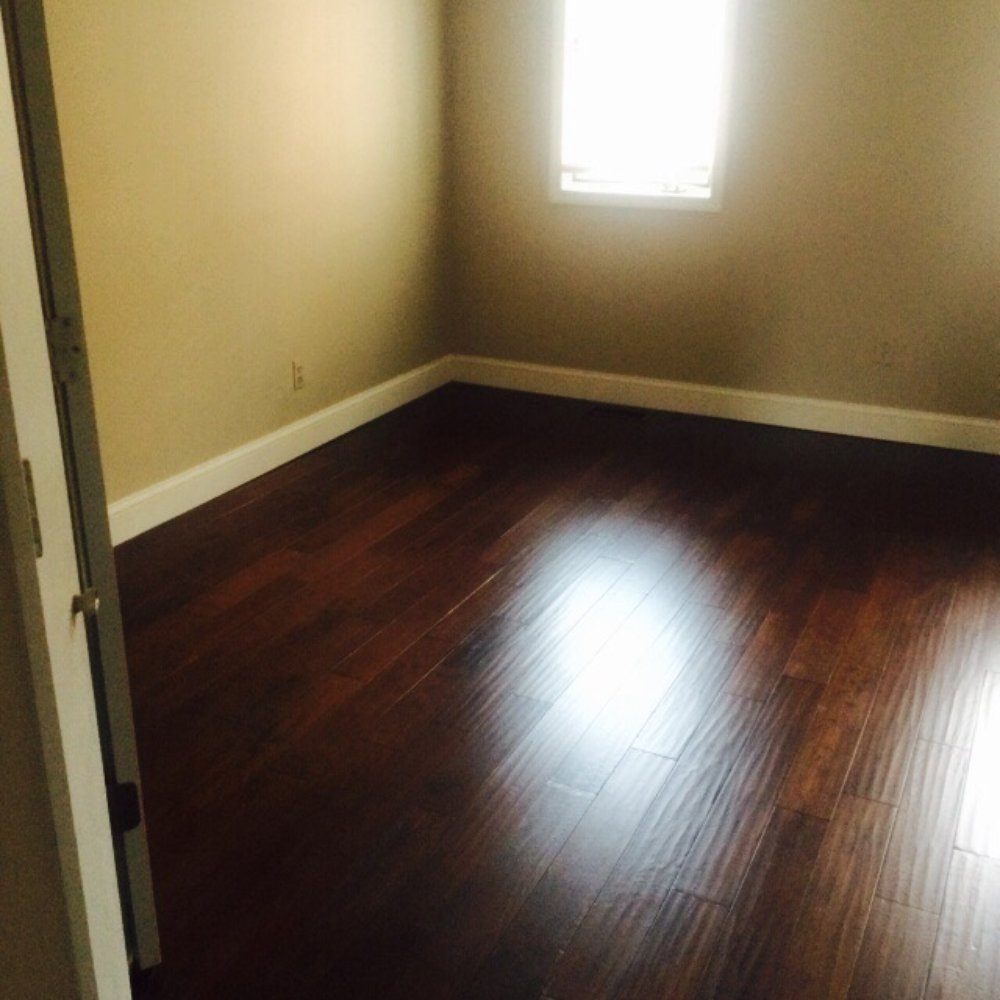 Floors On 14th - Second bedroom with finished paint, floors, and baseboards. - Flooring Near Me - Washington, DC, District of Columbia Floors On 14th - Second bedroom with finished paint, floors, and baseboards. - Flooring Near Me - Washington, DC, District of Columbia