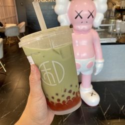 Harmony Tea Shoppe - Matcha Milk Tea with strawberry popping boba