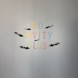 Keiki Smiles of Leeward - I thought it was so cute they have a no cavity club wall!