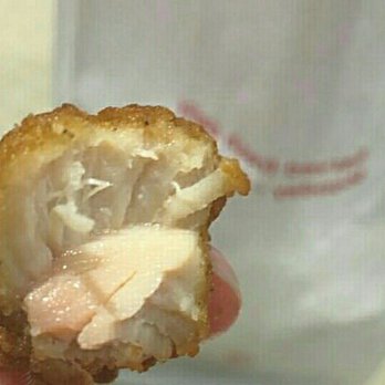 Chick-fil-A - Raw chicken. Jeff White no longer allows his store to cook chicken well done by request.This is what I was served & gave me food poisoning. - Fast Food Near Me - Dallas, Texas