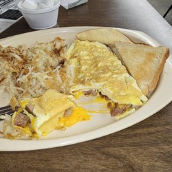 Cheese and sausage omelet, hash browns, and toast.