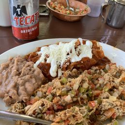 Red chilaquiles with rabbit machaca. Amazing!!! Red chilaquiles with rabbit machaca. Amazing!!!