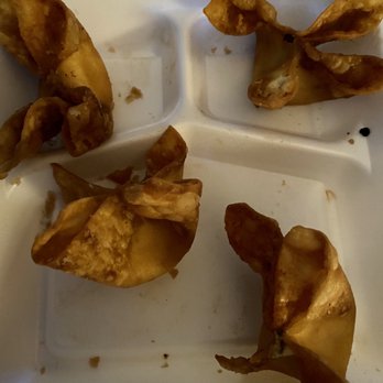 Panda Express - My very burnt and oily received order featuring blackened burnt pieces(?) inside the food product and container. - Chinese Near Me - Derby, Kansas