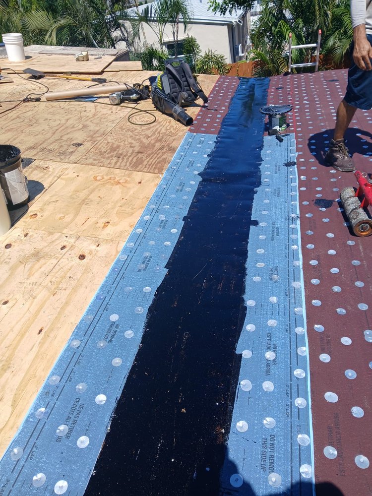 Slide of MZ Roofing Service