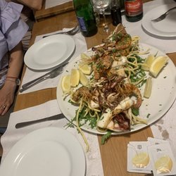 Bufala Allegra - Grilled scampi and calamari over arugula and fry potato.