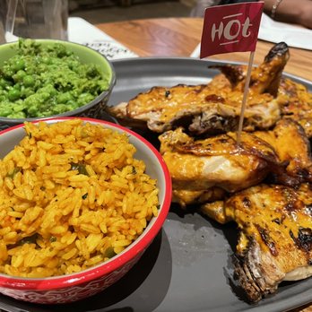 Nando's Peri-Peri - Full platter - whole chicken, macho peas, Portuguese rice - Chicken Shop Near Me - Chicago, Illinois Nando's Peri-Peri - Full platter - whole chicken, macho peas, Portuguese rice - Chicken Shop Near Me - Chicago, Illinois