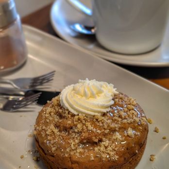 Tuba Cafe - Vegan carrot cake with a latte and cinnamon to sprinkle on top - Cafes Near Me - Squamish, British Columbia Tuba Cafe - Vegan carrot cake with a latte and cinnamon to sprinkle on top - Cafes Near Me - Squamish, British Columbia
