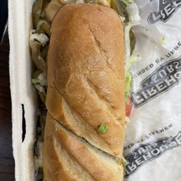 veggie sandwich with onions, mushrooms, and green bell peppers grilled with cheese before adding fresh produce on top veggie sandwich with onions, mushrooms, and green bell peppers grilled with cheese before adding fresh produce on top