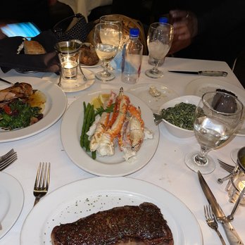 Ocean Prime - Wagyu New York Strip , crab legs asparagus and drawn butter, spinach - Seafood Near Me - Beverly Hills, California