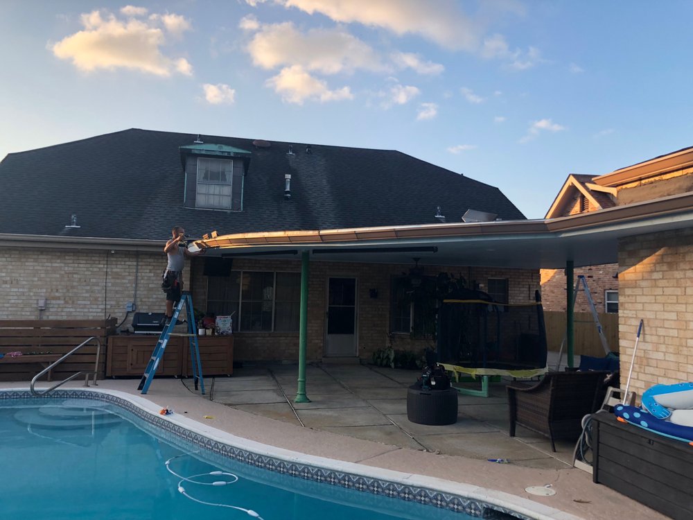 Slide of Pelican Roofing Group