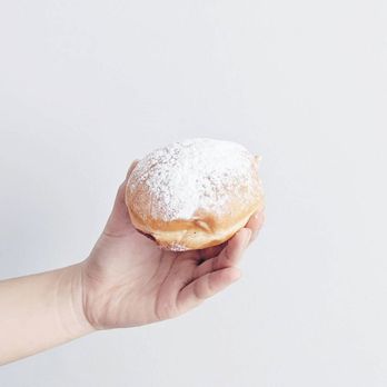 Krispy Kreme's Doughnut Cafe - Powdered with strawberry filling - Donuts Near Me - Toronto, Ontario